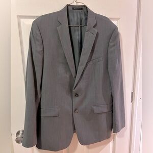 Calvin Klein blazer size is 44 slim fit